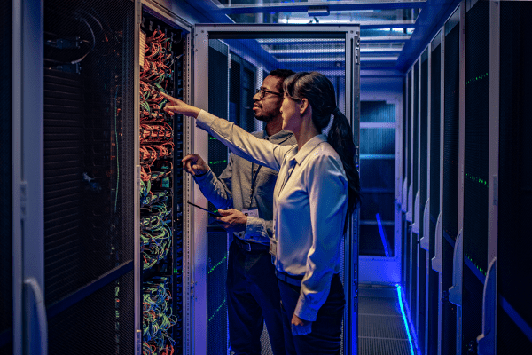 Engineers in a server room