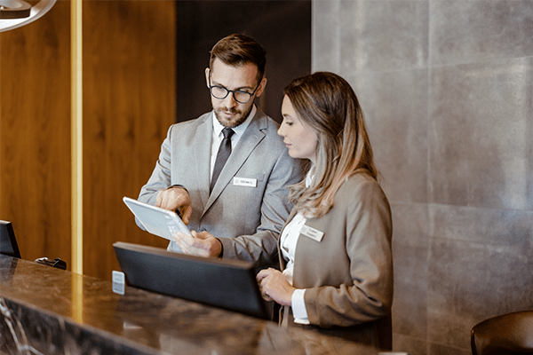 Hotel staff on computers