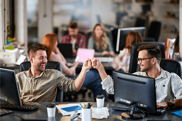 Office workers celebrating