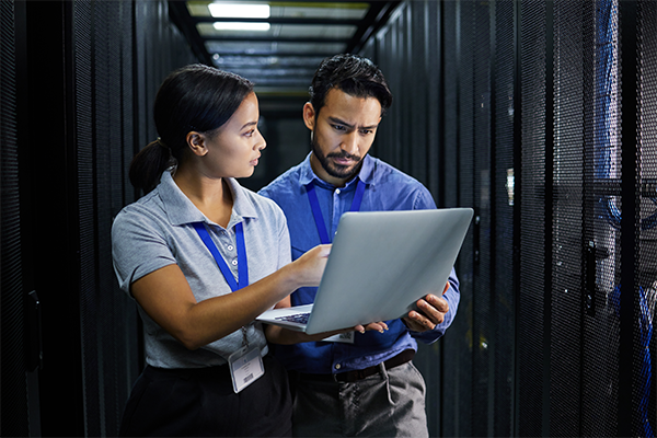 IT professionals working in a server room