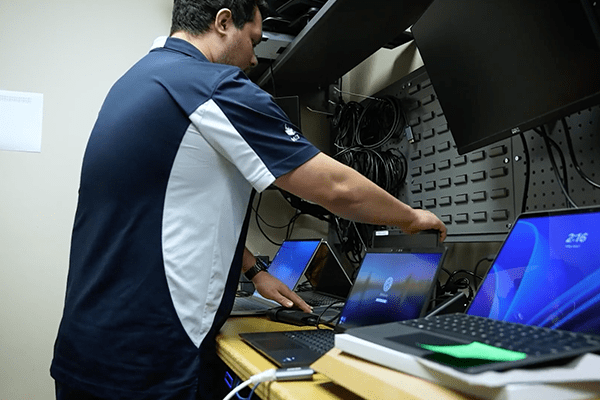 MITS team member working on new devices