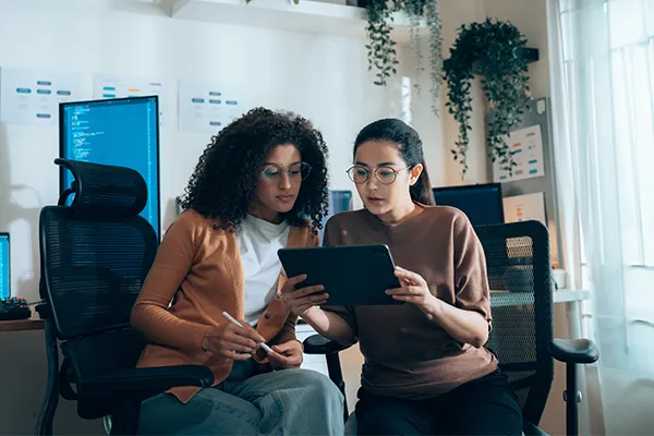 Business owner looking at an iPad