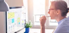 Woman designing a website layout