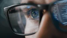 IT worker looking at a computer