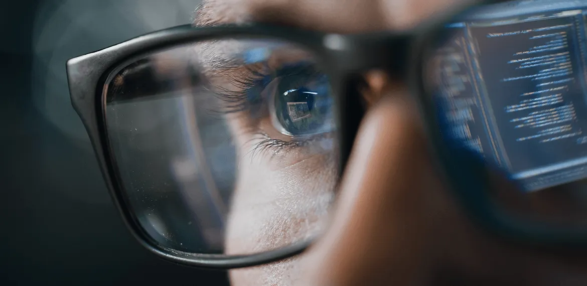 IT worker looking at a computer