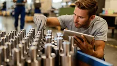 Factory worker checking inventory