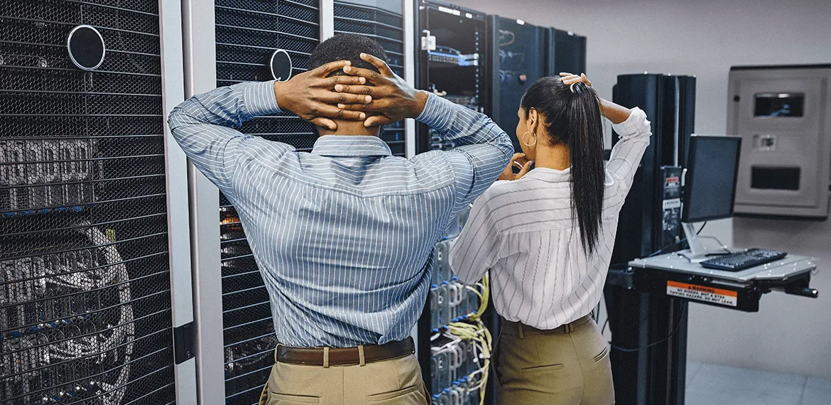 Confused workers looking at servers