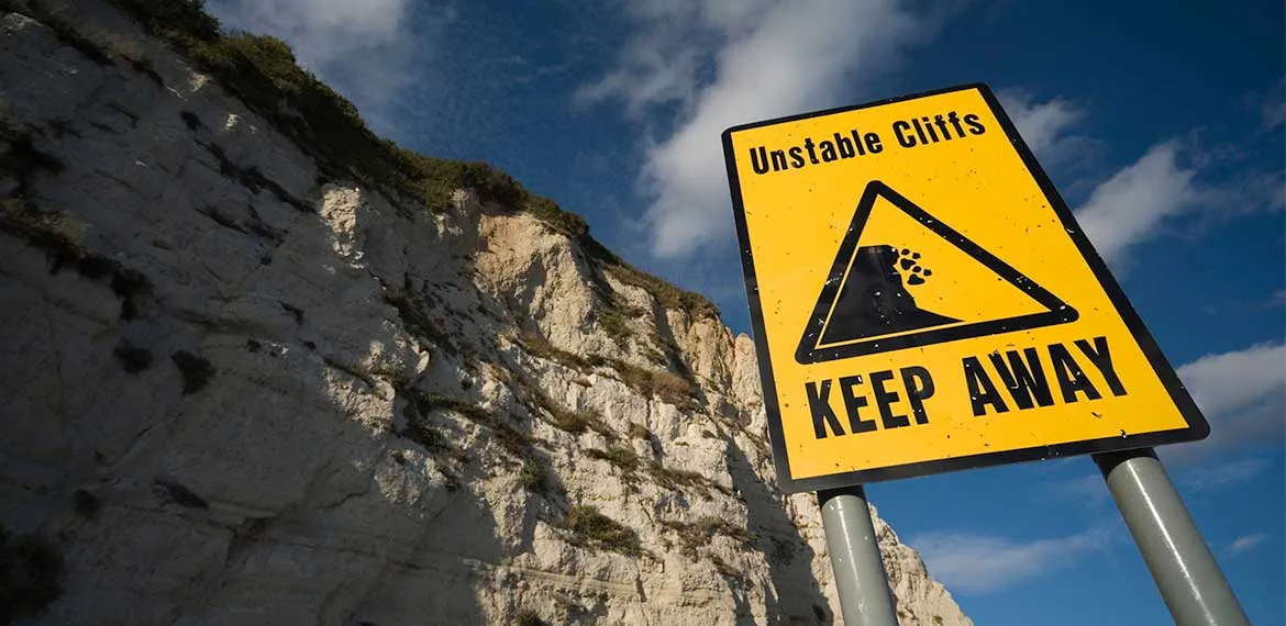 caution sign in mountains